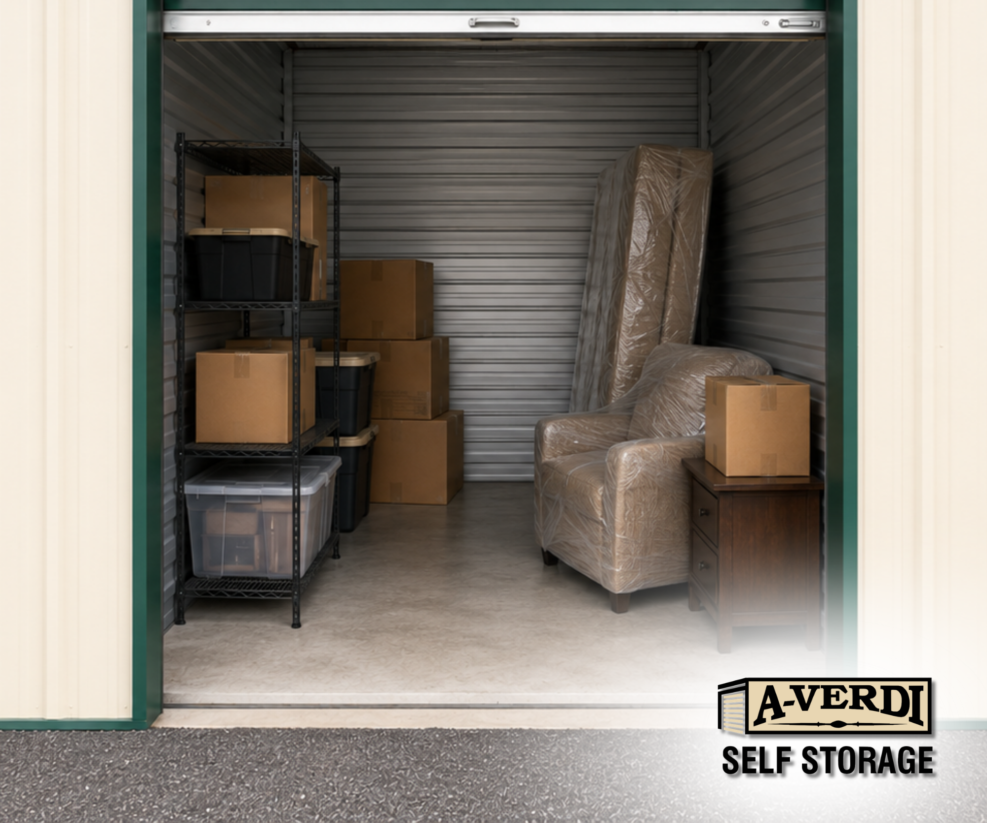 Organized 10x10 self storage unit with boxes, shelving, plastic totes, and wrapped furniture at A-Verdi Self Storage.